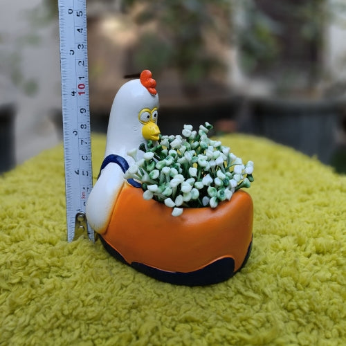 Orange hen planter