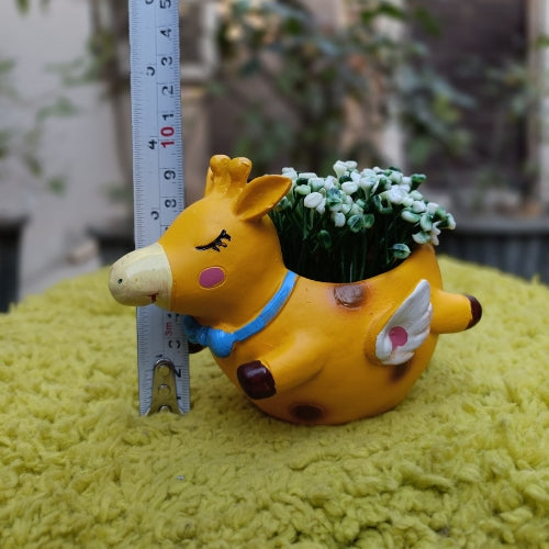 Flying girraffe planter