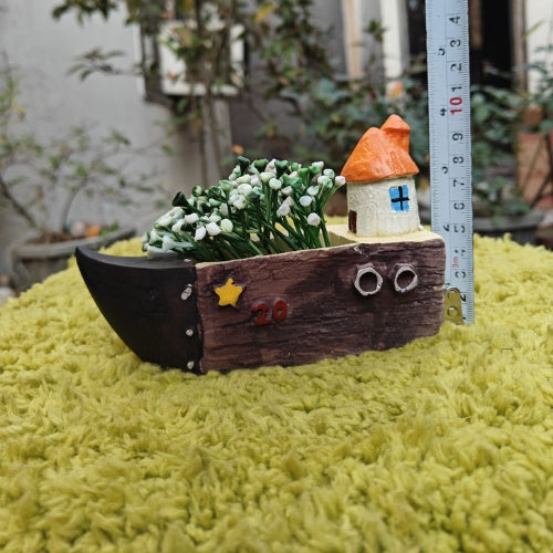 House on boat planter