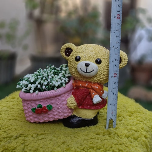 Pink muffler teddy planter