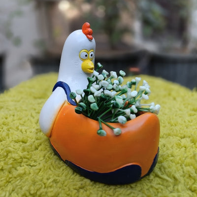 Orange hen planter