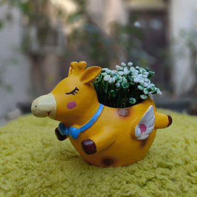 Flying girraffe planter