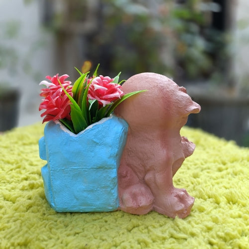 Dog with blue bag planter