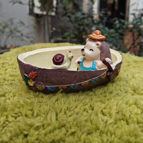 Hedgedog on boat planter