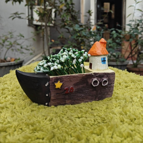 House on boat planter