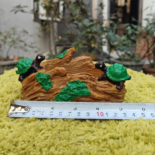 Tortoise on bark planter