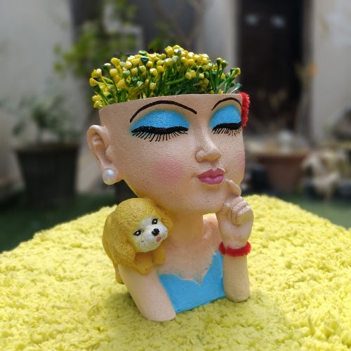 Girl with dog planter