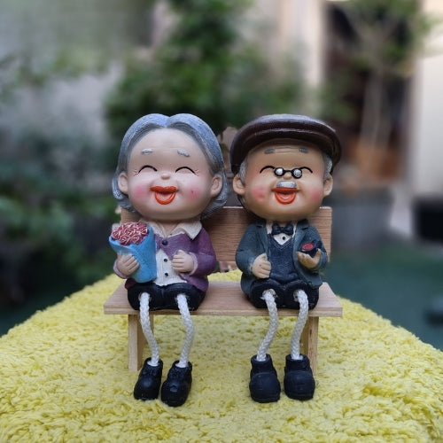 Dada dadi hanging legs sitting on bench