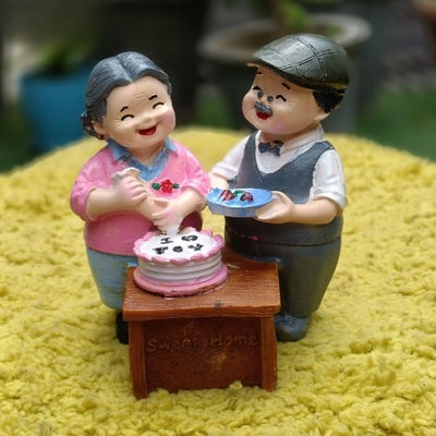 Grandsparents cutting cake