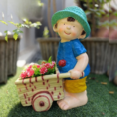 Boy with cart big planter