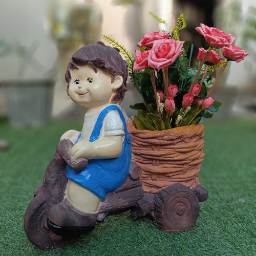 Boy on cycle big planter