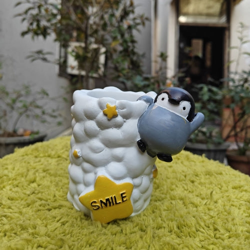 Penguine smile planter model 1
