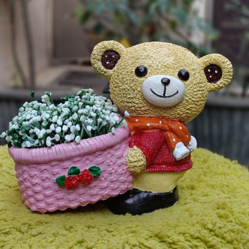 Pink muffler teddy planter